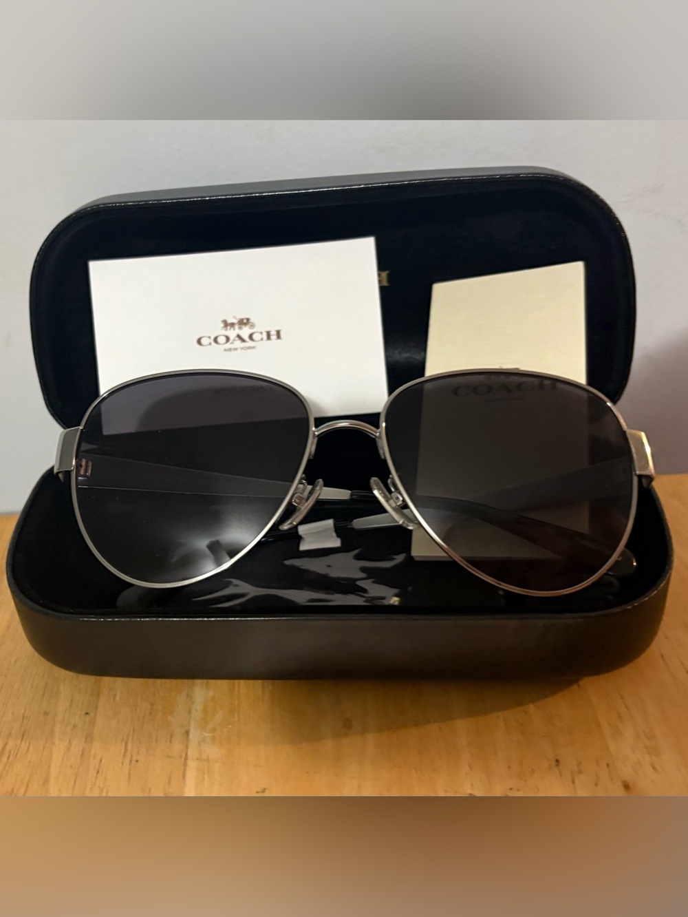COACH Silver Frame Sunglasses with Dark Gray Lenses
